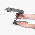 AMP09303 - Laptop Stand | LD206C in Space Gray showing a person adjusting the angle of the stand