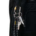 AHP08894 - Carabiner | LF101 in black showing the carabiner with keys  attached to the strap of the bag
