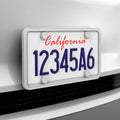ACP12020 -  License Plate Frame | LP100 in White showing the front and sides installed to a car