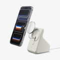 AMP09171 - Magsafe Charger Stand (Mag Fit) in Dune Beige showing the device hovering in front of the magsafe charger stand, while magnet partially detached from the stand