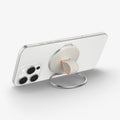 AMP09176 - O-Mag Magnetic Phone Holder (MagFit) OM104 in Dune Beige showing the back, top and side of the device o mag ring showing sides, ring propped up as a kickstand in 