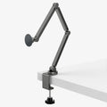 AMP09694 - Phone OneTap Clamp (MagFit) in Space Gray showing the front and side attached to the side of the table