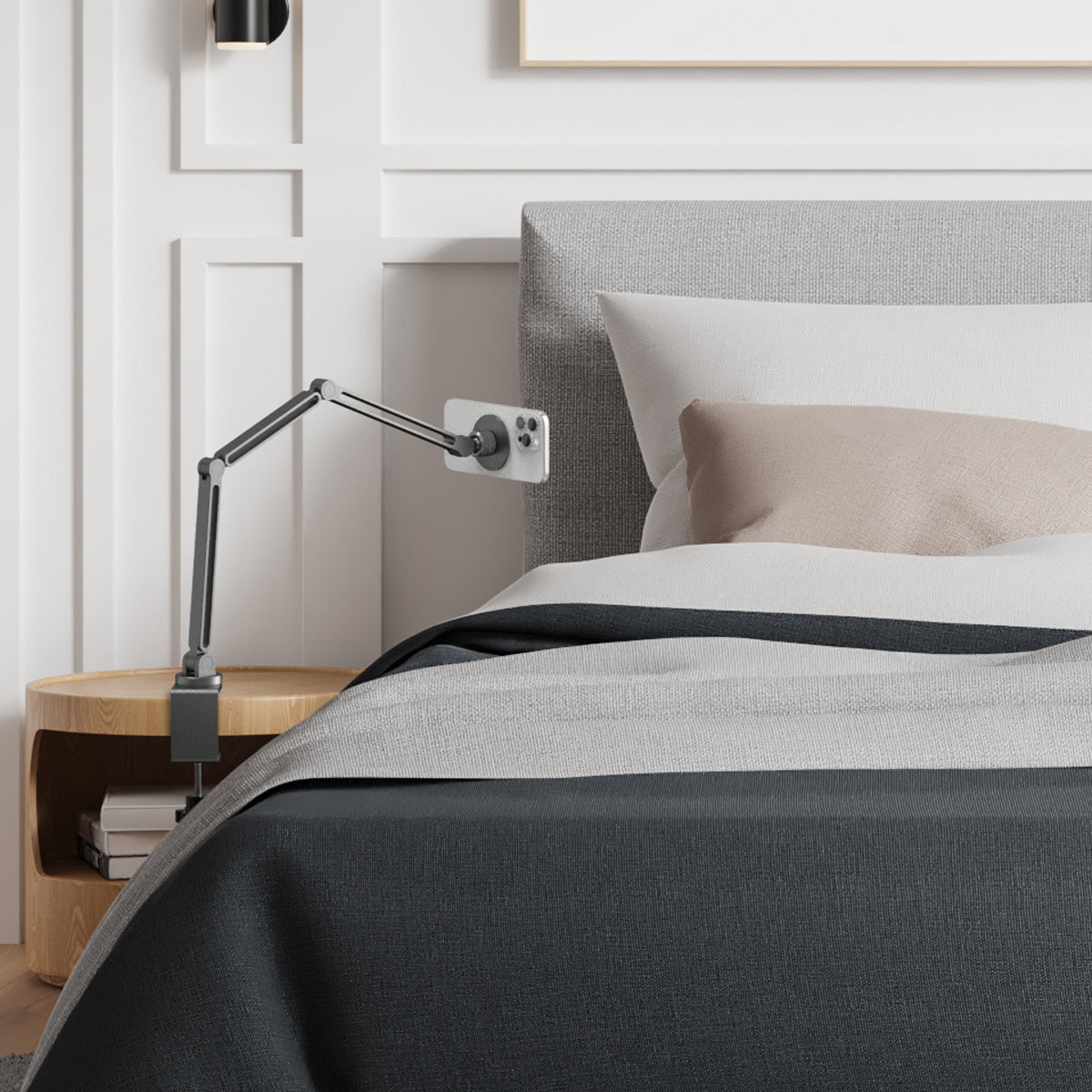 AMP09694 - Phone OneTap Clamp (MagFit) in Space Gray showing the attached beside the bed