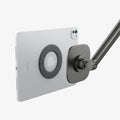 AMP09191 - OneTap Clamp in Space Gray showing the back hovering in front of the device back