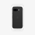 AGL08938 - Pixel 9a GLAS.tR EZ Fit in Clear showing the back of the device with tray attached in front partially showing its sides