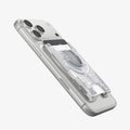 AFA11305 - Ultra Hybrid MagFit card wallet transparent white attached to iPhone at angled side view showing slim profile raised card slot and visible circuit inspired internal design