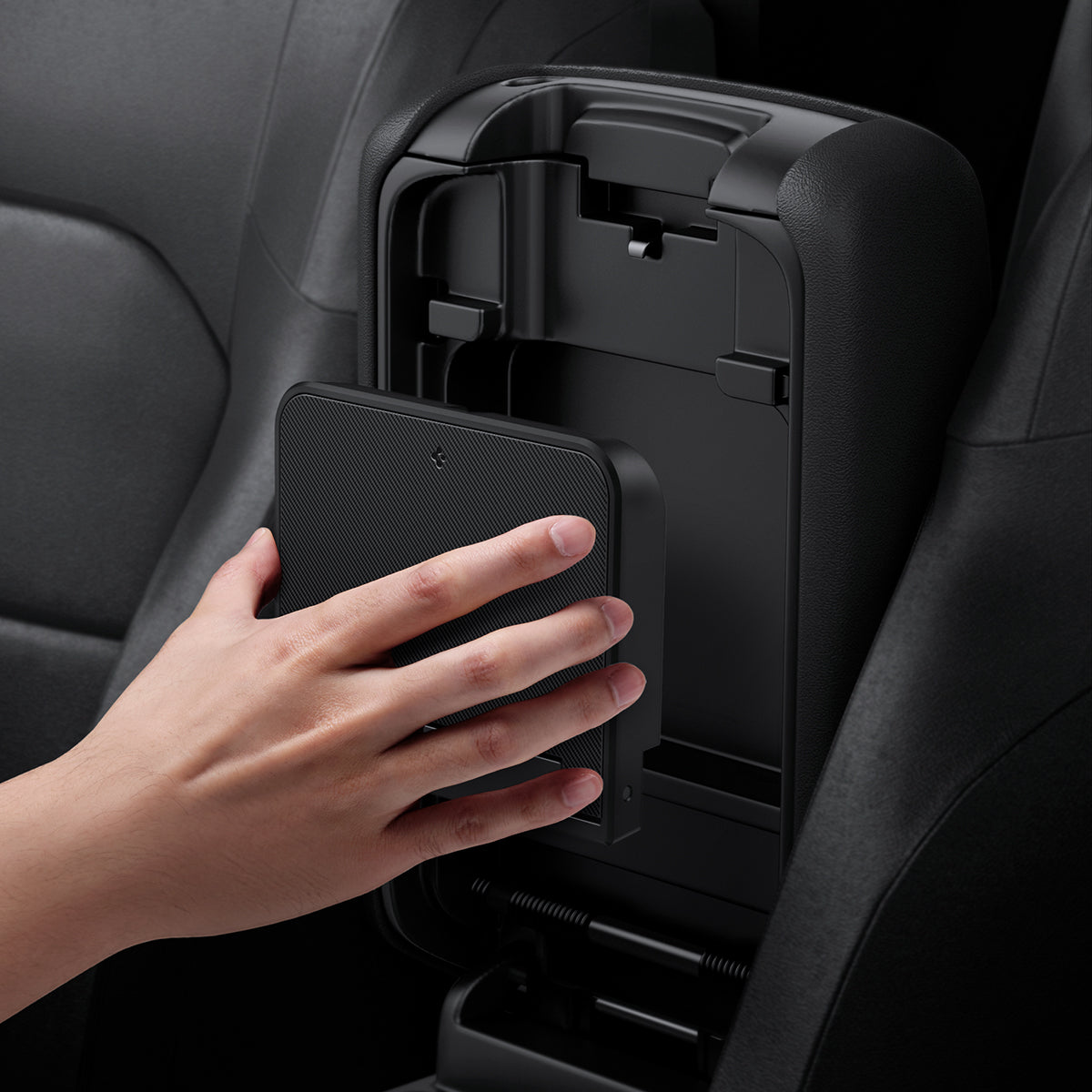 ACP09216 - Jeep Series -  Center Console Hidden Storage Box | JO221 showing install with hand.