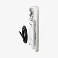 AFA08888 - Ultra Hybrid MagFit+ Wallet (MagFit) in Crystal Clear showing the side of the mag-ring hovering in front of the wallet case attached to a device showing partial sides
