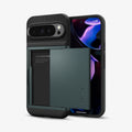 ACS07730 - Pixel 9 Pro XL Case Slim Armor CS in Abyss Green showing the back, card slider open, and behind it, a device showing partial front and sides