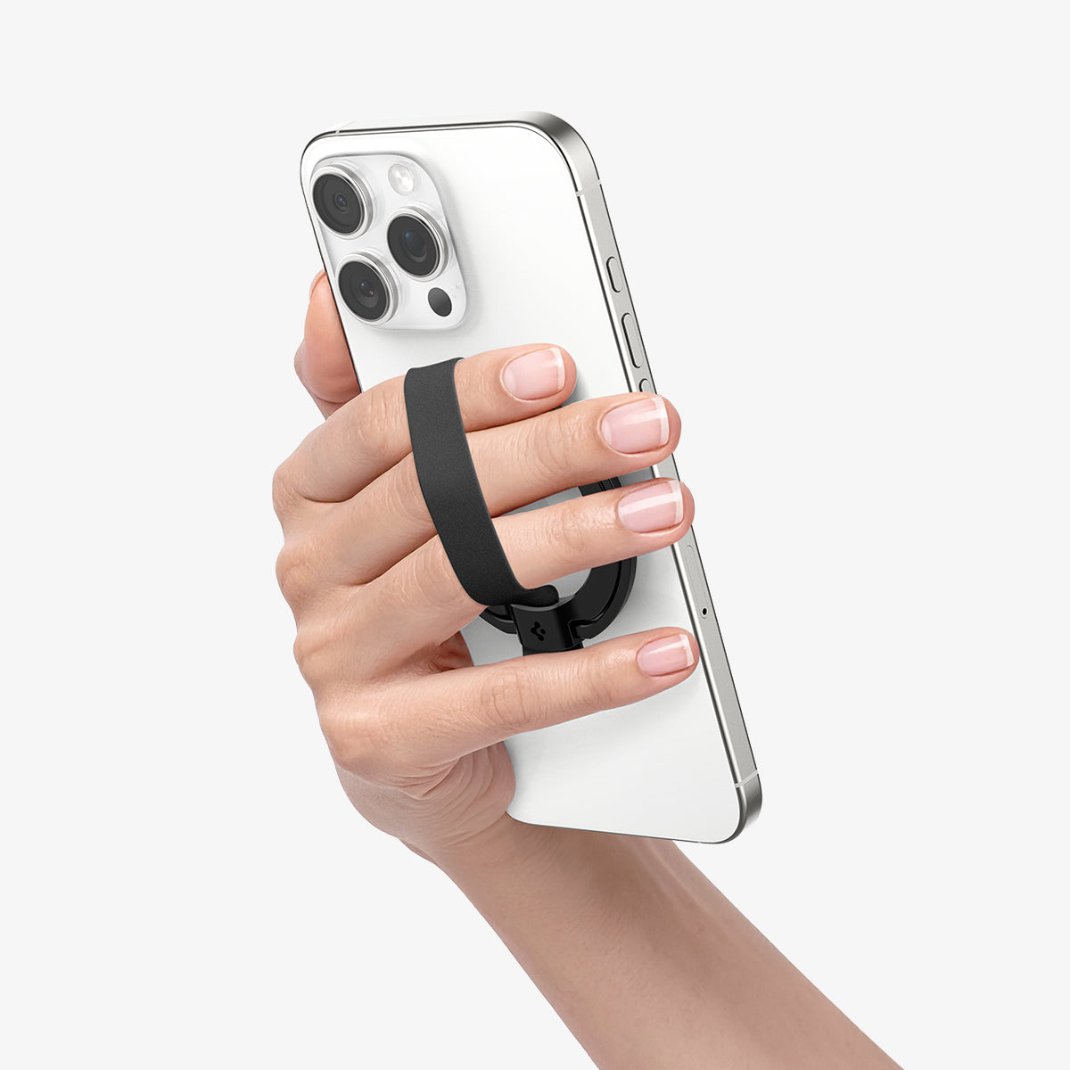 AMP08551 - O-Mag Magnetic Phone Holder (MagFit) | OM103 in Black showing a person holding the ring holder attached to the device