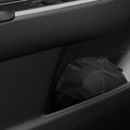 ACP09093 - R1S (2022-2025) Rivian CryoShade RO260 in Black showing the sunshade stored in a small space of the vehicle