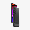 ACS07346 - Galaxy S24 Case Rugged Armor in Matte Black showing the partial front, partial sides of a device hovering above another device showing back