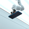 AGL07438 - Galaxy S25 GLAS.tR EZ Fit in Clear showing the front of the device with a robot attached on its back