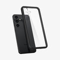 ACS07330 - Galaxy S24 Plus Case Ultra Hybrid in Matte Black showing the back of a transparent case with a darker frame hovering above the device