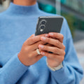 ACS09426 - Galaxy S25 Edge Case Liquid Crystal in Space Crystal showing a woman holding the device with the case comfortably