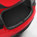 ACP11540 - Tesla Series Trunk Sill Guard Black Spigen bumper scuff plate installed along the trunk opening edge of a red Tesla Model 3