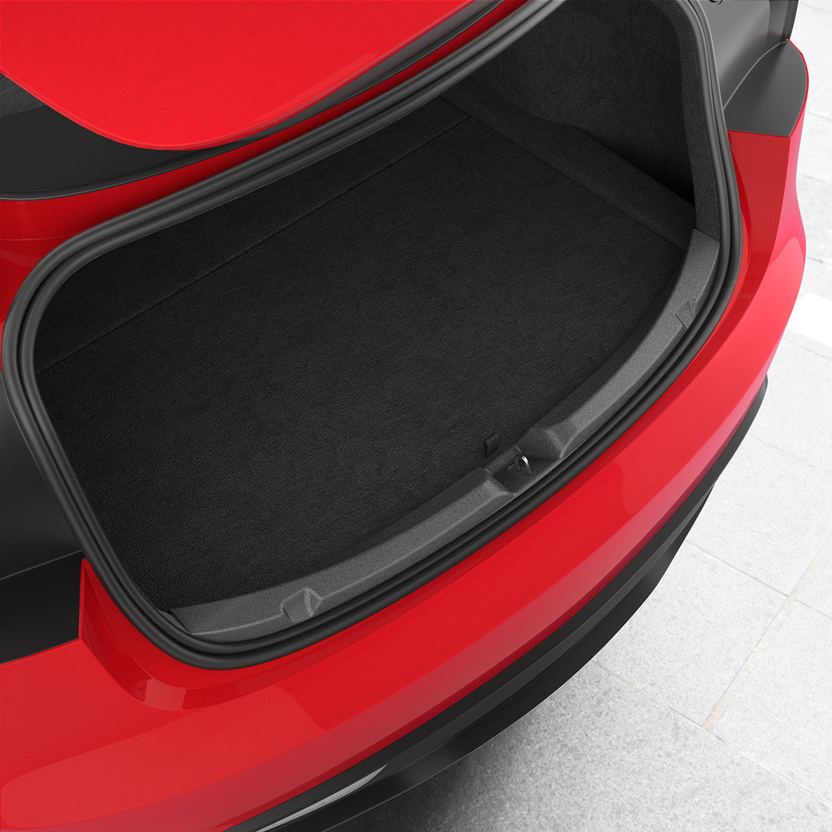 ACP11540 - Tesla Series Trunk Sill Guard Black Spigen bumper scuff plate installed along the trunk opening edge of a red Tesla Model 3