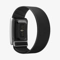AMP10187 - WHOOP 5.0 fabric band black rear view showing sensor module mounted in Spigen band with woven exterior ribbed interior and metal clasp for secure fit