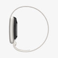 AMP10188 - WHOOP 5.0 fabric band starlight side profile showing slim sensor housing low profile fit and continuous adjustable strap for lightweight comfort