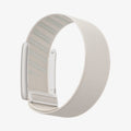 AMP10188 - WHOOP 5.0 fabric band starlight side angle showing open metal clasp lightweight woven strap and adjustable closure mechanism
