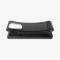 ACS08859 - Xiaomi 15 Case Rugged Armor in Matte Black showing the 
the back, partially bent while hovering above the device