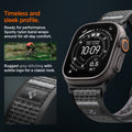 AMP11113 - Apple Watch Ultra Athlex Air 2 band lifestyle image showing rugged gray stitched nylon strap on Apple Watch Ultra with close-up of subtle logo patch highlighting timeless sleek profile sporty performance design and all-day comfort during outdoor cycling activity