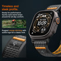 AMP10607 - Apple Watch Ultra Athlex Air 2 band lifestyle image showing rugged orange stitched nylon strap on Apple Watch Ultra with close-up of subtle logo patch highlighting timeless sleek profile sporty performance design and all-day comfort during outdoor cycling activity