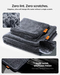 ACP11389 - Folded Spigen microfiber towels with close-up insets showing the soft, edgeless fiber loops that prevent scratches