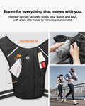 AMP11390 - Dynamic Shield™ Running Vest | A720 L-XL in Black showing the room for everything that moves with you. The rear pocket securely holds your wallet and keys, with a key clip inside to minimize movement