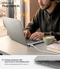 ACS10974 - MacBook Air 13-inch in Heather Gray showing lifestyle shot of working at cafe with charger plugged in; highlights precise cutouts for easy access to all ports