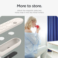 ACS07975 - Google TV Streamer Silicone Fit Voice Remote in Porcelain showing the easy attachment. Attach the magnetic plate and easily snap it onto any metal surface