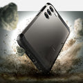ACS05719 - Galaxy S23 Case Tough Armor in gunmetal showing back in front of the rock.