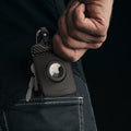 ACP08793 - Tesla AirFit Key Card Holder 2-pack | TO244 showing the key card holder being placed in back pocket