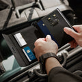 AFA05538 - Passport Holder in black showing the whole inner with slots for cards, passport, sim cards and pin ejector