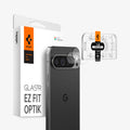 AGL08444 - Pixel 9 Pro Case Optik EZ Fit Lens Protector in Crystal Clear showing the installation tray hovering in front of the lens protector and the device, behind it, is the packaging